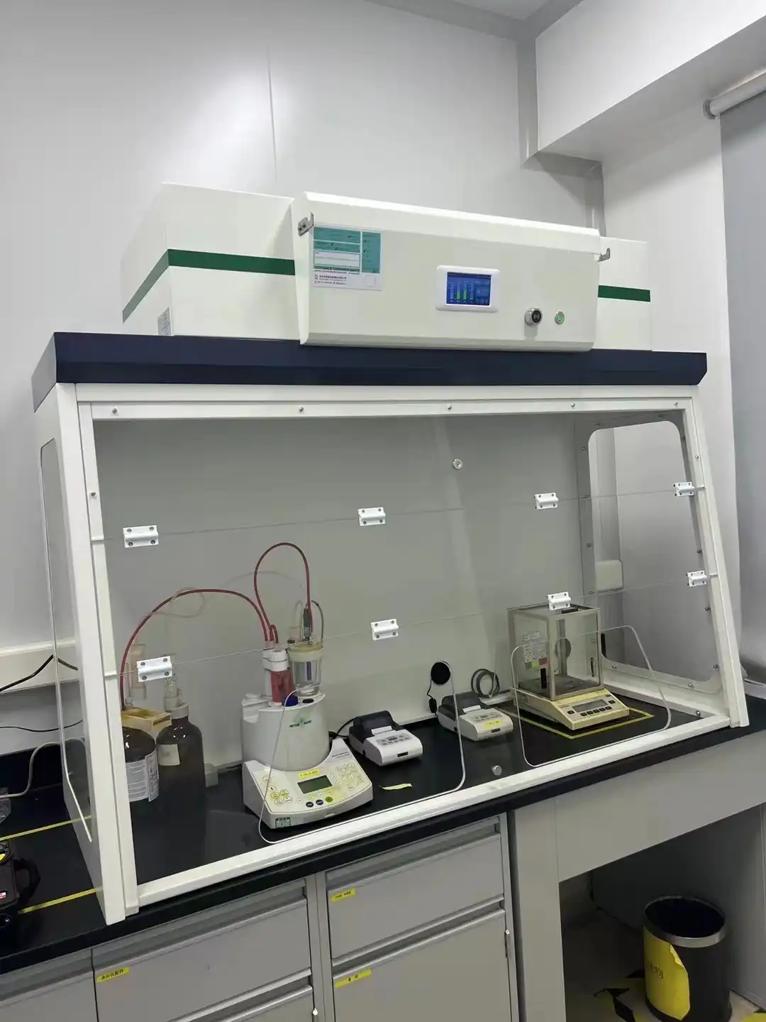 What are portable ductless fume hoods used for?